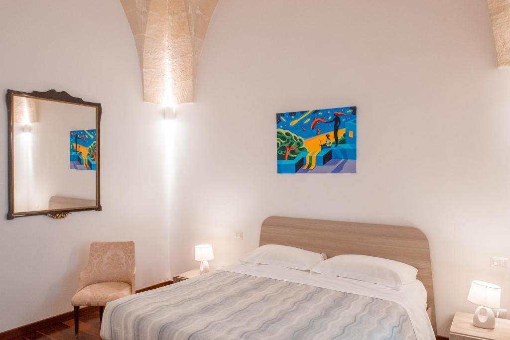 Postel nebo postele na pokoji v ubytování Tulliani Residenze Matera