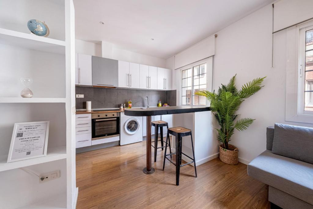 Kuchyňa alebo kuchynka v ubytovaní Caliu Apartments Barcelona - Fira