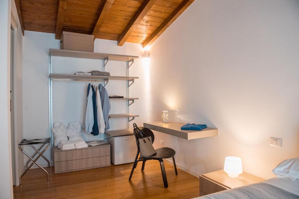 Postel nebo postele na pokoji v ubytování Tulliani Residenze Matera