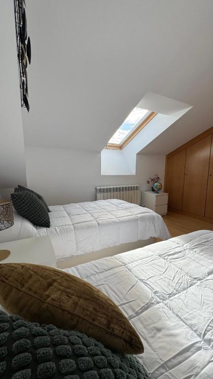 Postel nebo postele na pokoji v ubytování Apartamentos Suites Olmedo