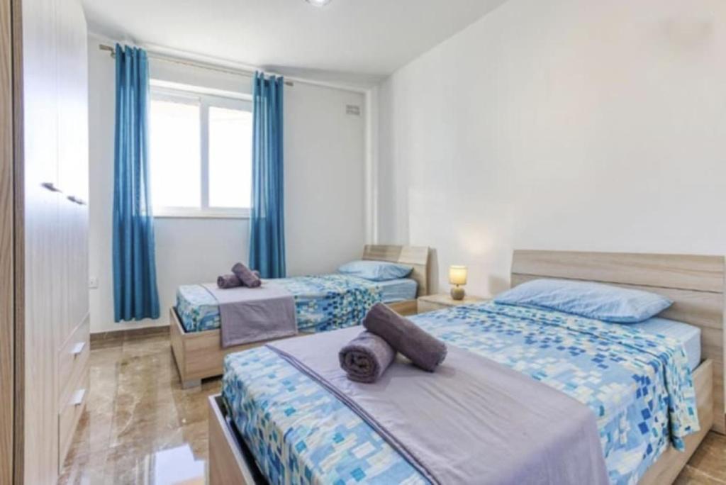 Postel nebo postele na pokoji v ubytování Apartment in Marsaskala