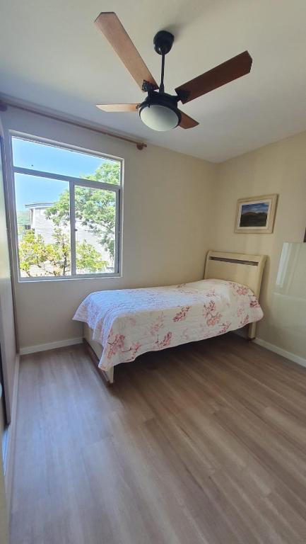 Postel nebo postele na pokoji v ubytování Quarto Pacífico