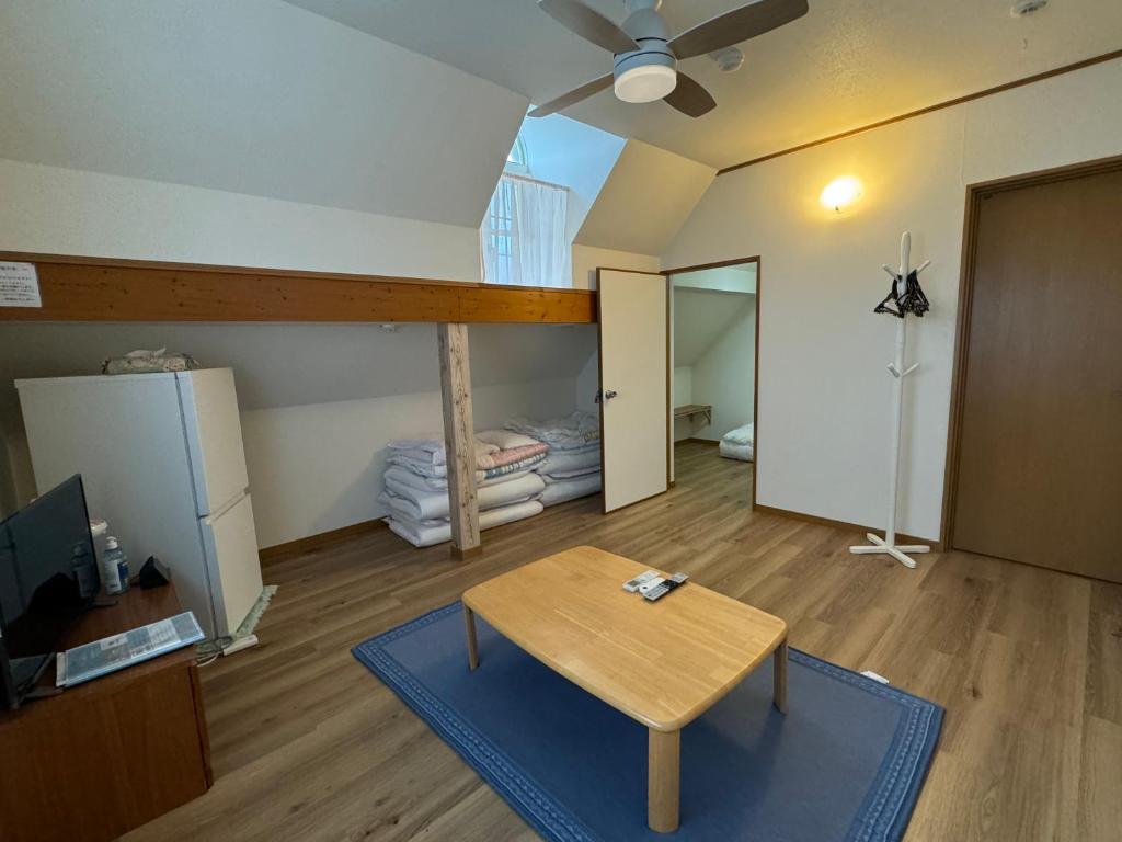 Postel nebo postele na pokoji v ubytování Guest house MICHISHIO
