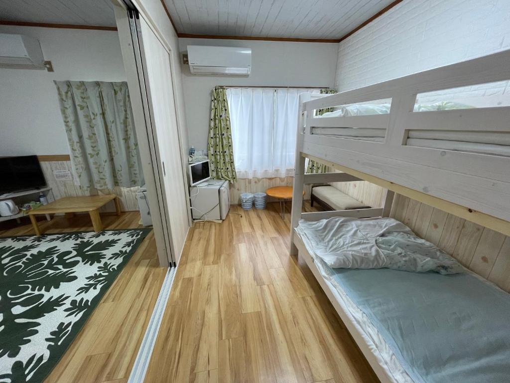 Postel nebo postele na pokoji v ubytování Guest house MICHISHIO