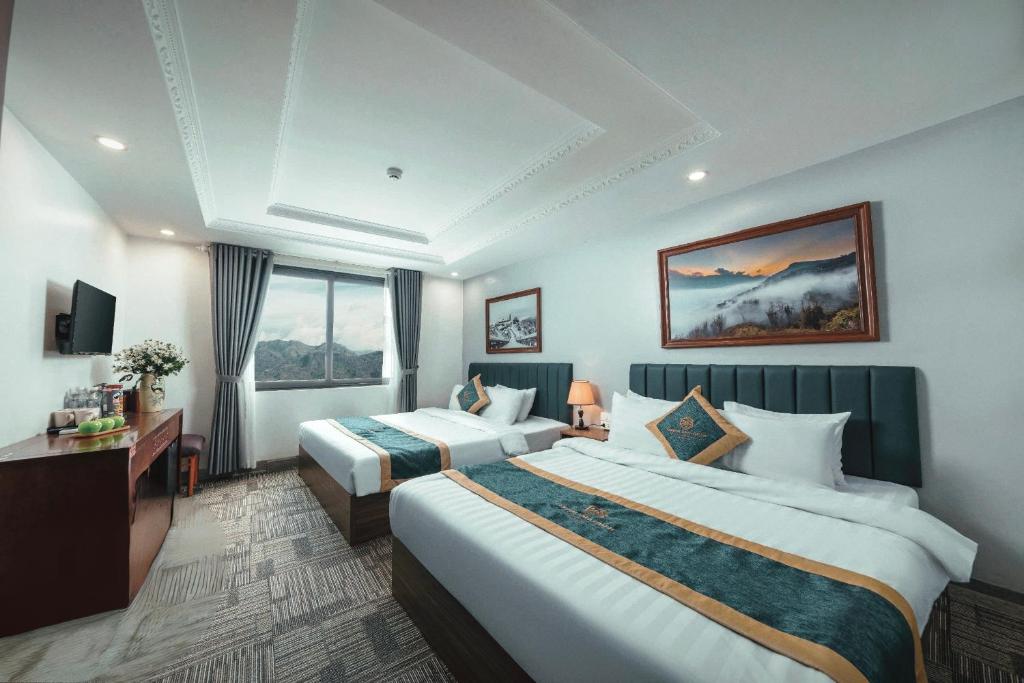 Giường trong phòng chung tại Central Sapa March Hotel