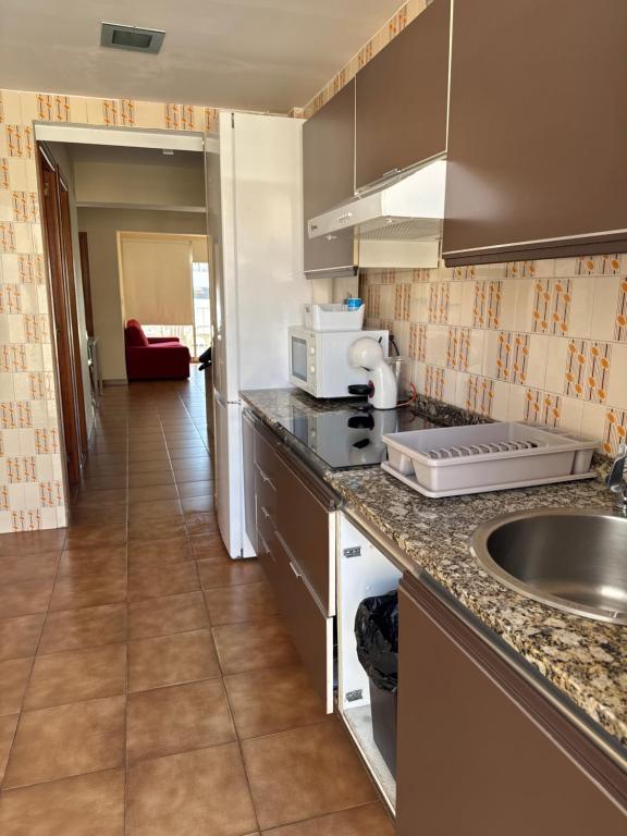 Kuchyň nebo kuchyňský kout v ubytování MAGNO CULLERA- Playa