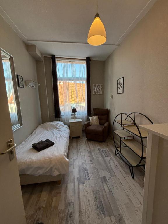 Postel nebo postele na pokoji v ubytování Blankebil Rooms