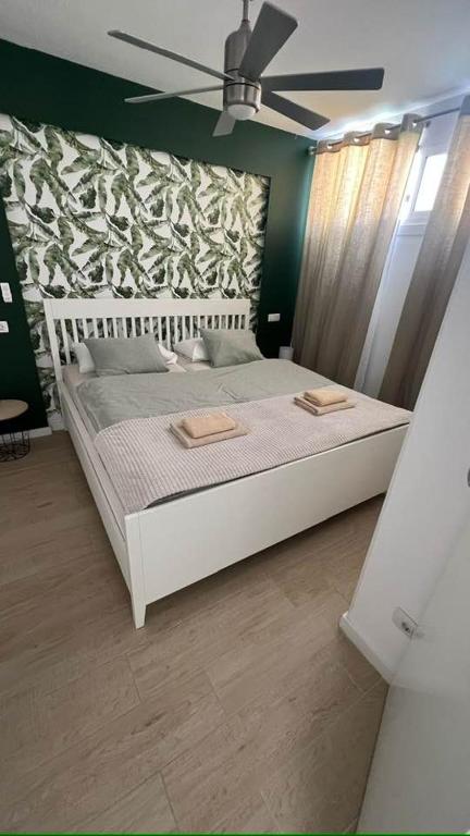 Postel nebo postele na pokoji v ubytování Royal Suite Diamantes I with AC