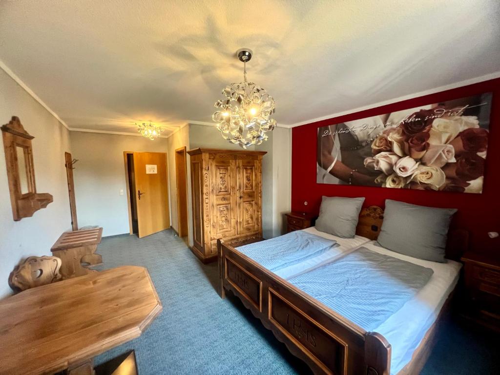Postel nebo postele na pokoji v ubytování Hotel das rot