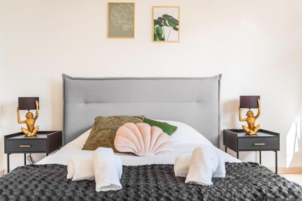 Postel nebo postele na pokoji v ubytování Le Solaris 3 chambres avec 2 grands lits et 3 simples