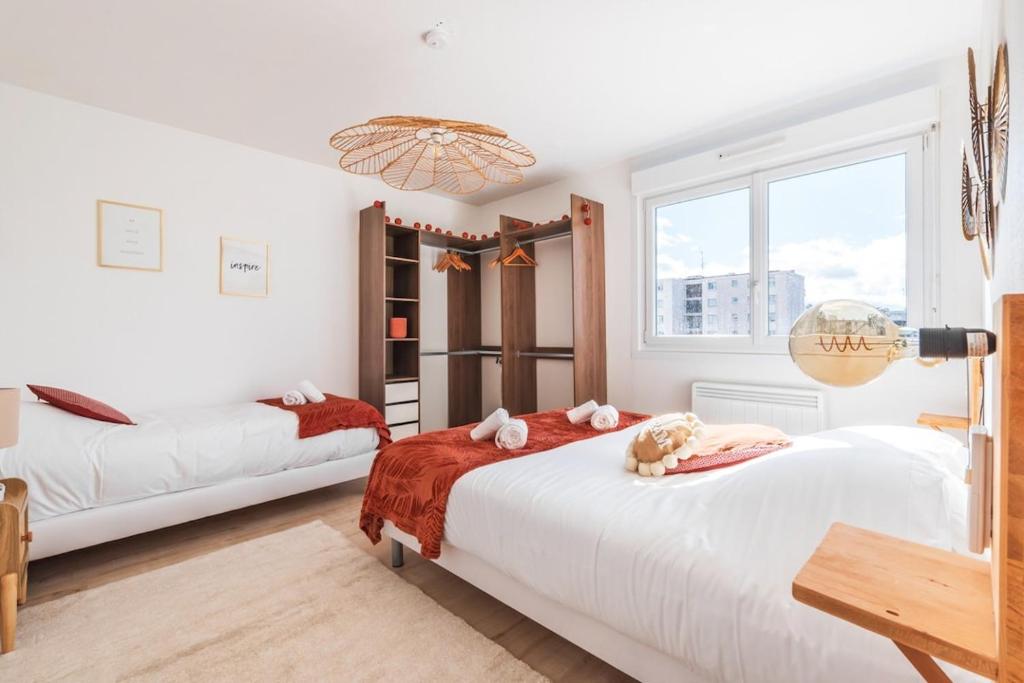 Postel nebo postele na pokoji v ubytování Le Solaris 3 chambres avec 2 grands lits et 3 simples
