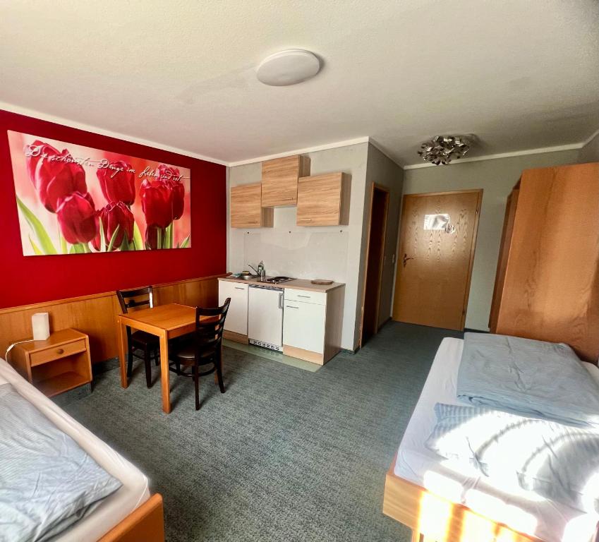 Postel nebo postele na pokoji v ubytování Hotel das rot