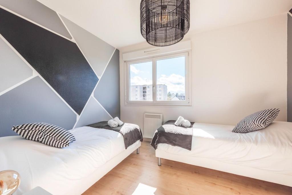 Postel nebo postele na pokoji v ubytování Le Solaris 3 chambres avec 2 grands lits et 3 simples