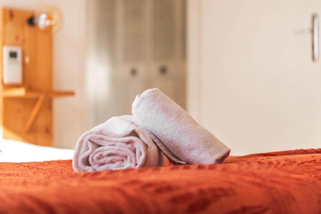 Postel nebo postele na pokoji v ubytování Le Solaris 3 chambres avec 2 grands lits et 3 simples