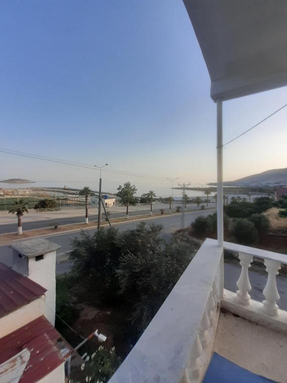 a view from the balcony of a house with a road at Huzur Pansiyon in Aydıncık