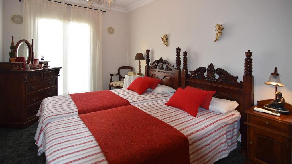 A bed or beds in a room at Casa Jimena