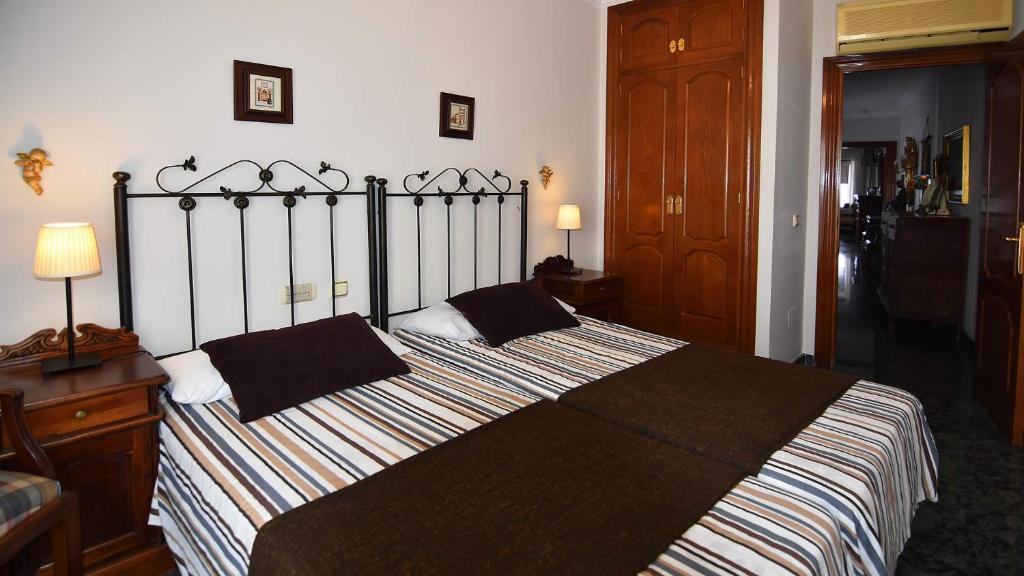 A bed or beds in a room at Casa Jimena