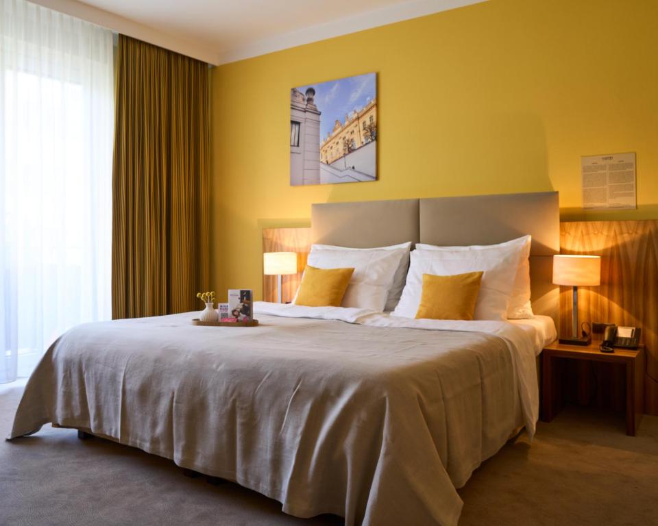 Posteľ alebo postele v izbe v ubytovaní Henriette Stadthotel Vienna