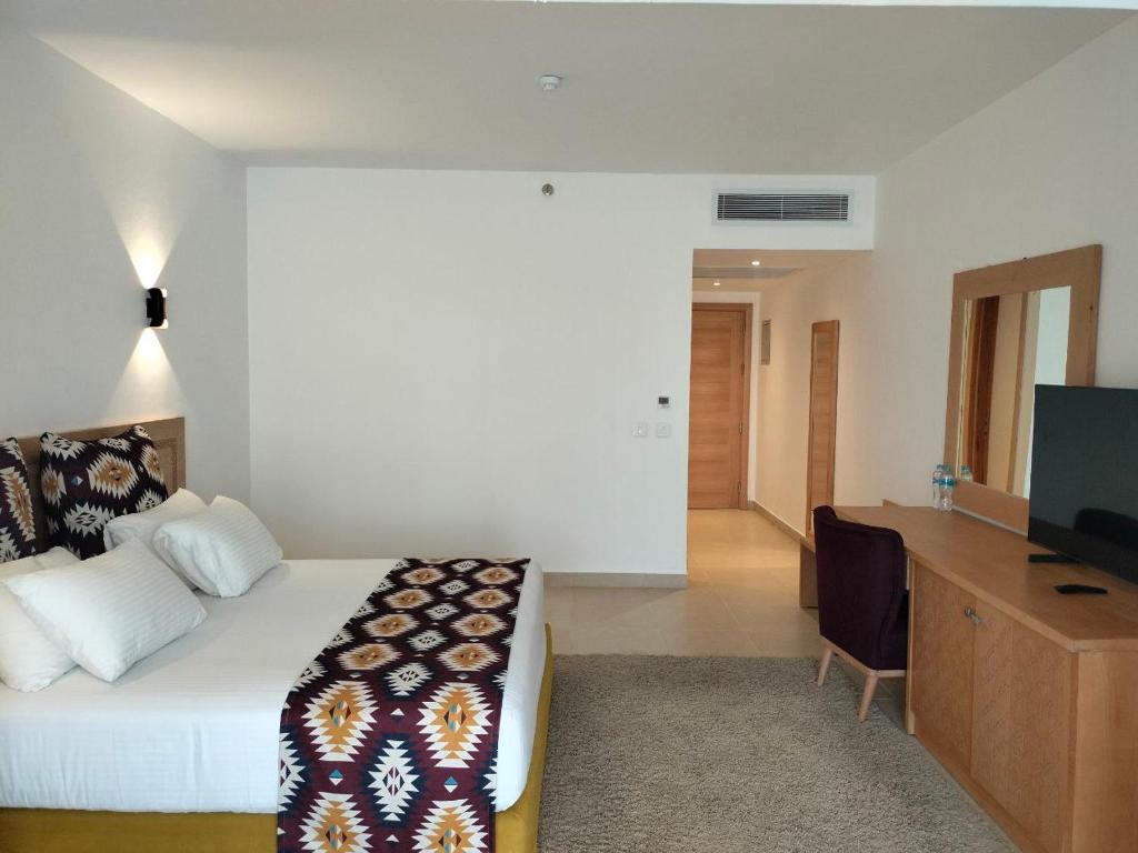 TV a/nebo společenská místnost v ubytování Tamra Beach Resort