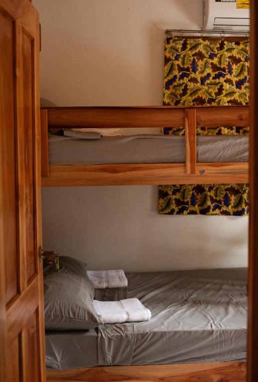 Letto o letti in una camera di La Chamba Surf House