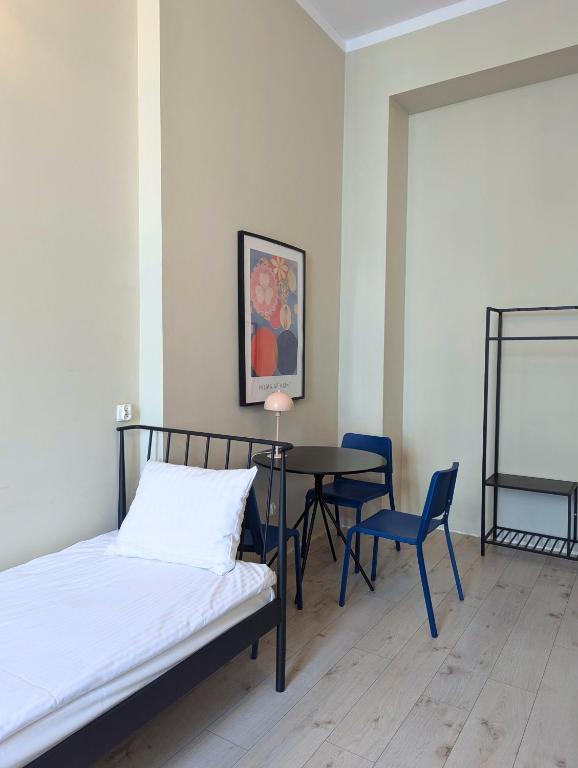 Voodi või voodid majutusasutuse RYNEK 30 Hostel toas
