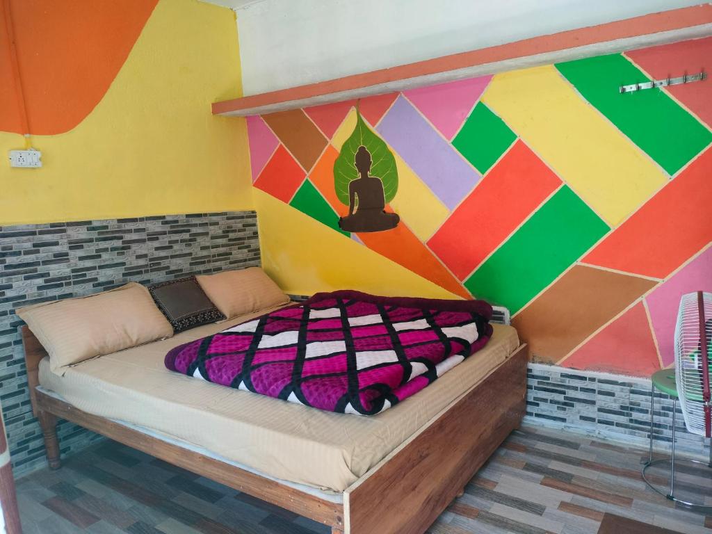 Postel nebo postele na pokoji v ubytování Moon Hotel Tungnath
