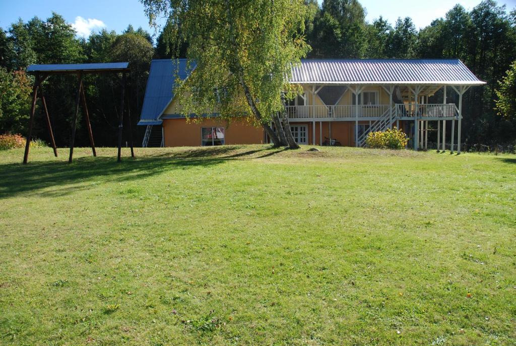 Sodas prie apgyvendinimo įstaigos Sodyba - Antalieptės marios