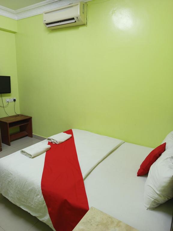 Postel nebo postele na pokoji v ubytování Hotel Dream Nur