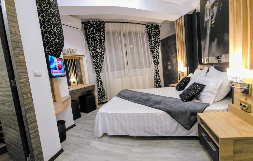 TV a/nebo společenská místnost v ubytování TheLine