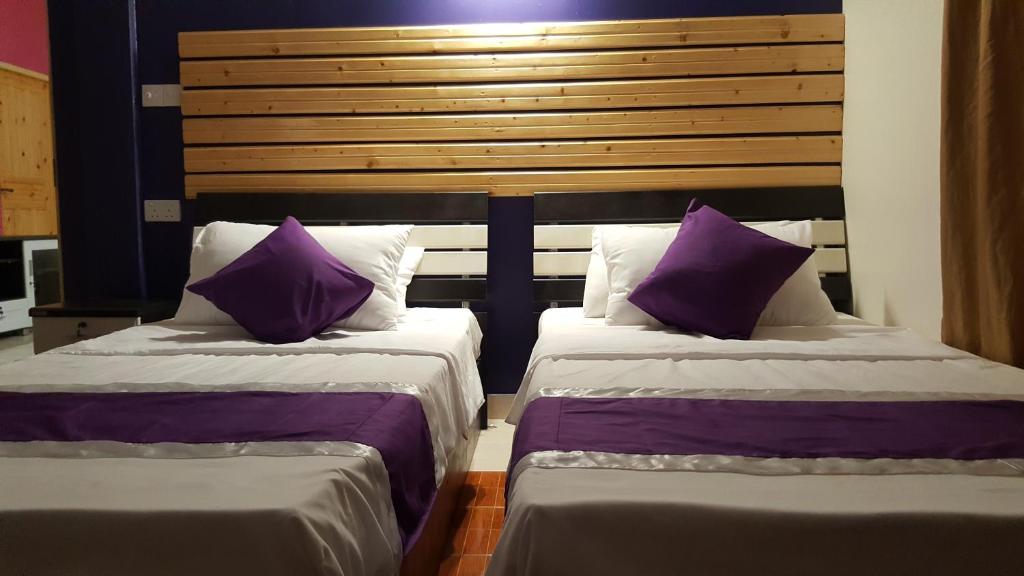 Postel nebo postele na pokoji v ubytování Finimas Residence