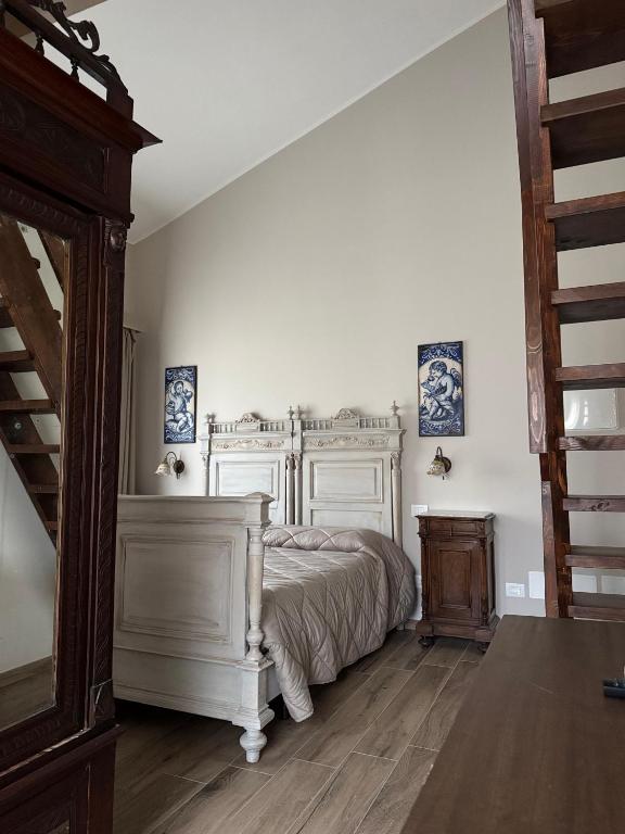 Postel nebo postele na pokoji v ubytování Agriturismo Borgo Furma