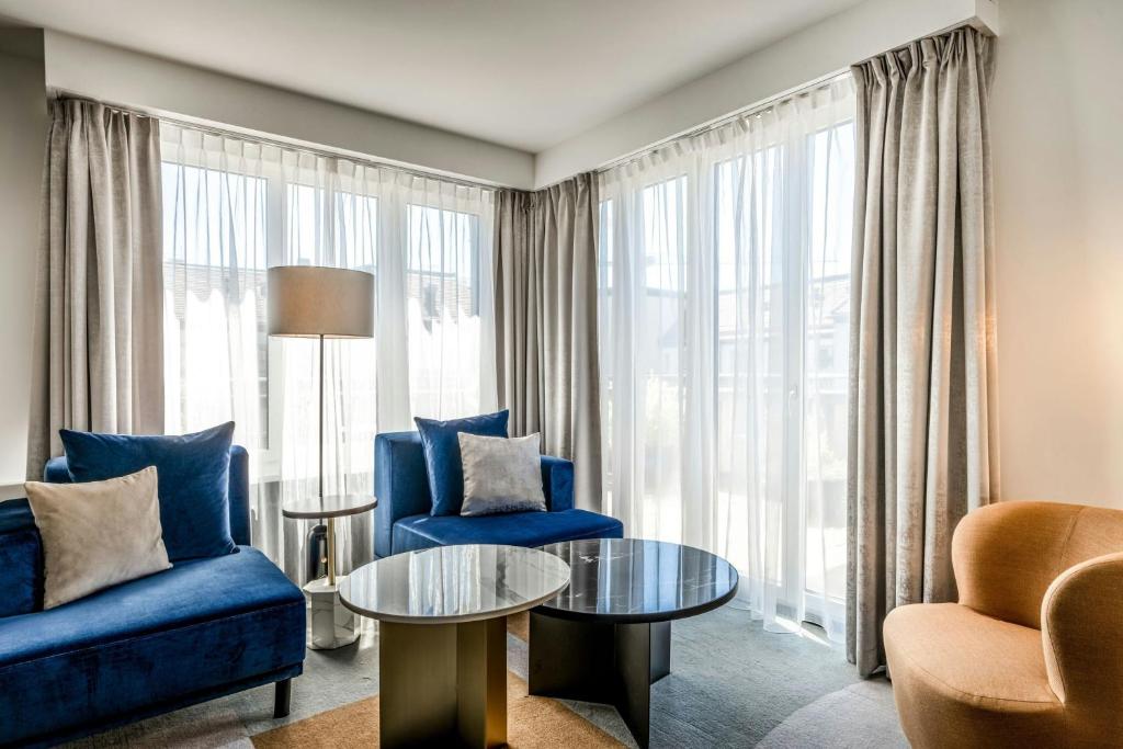 Posezení v ubytování Neues Schloss Privat Hotel Zurich, Autograph Collection