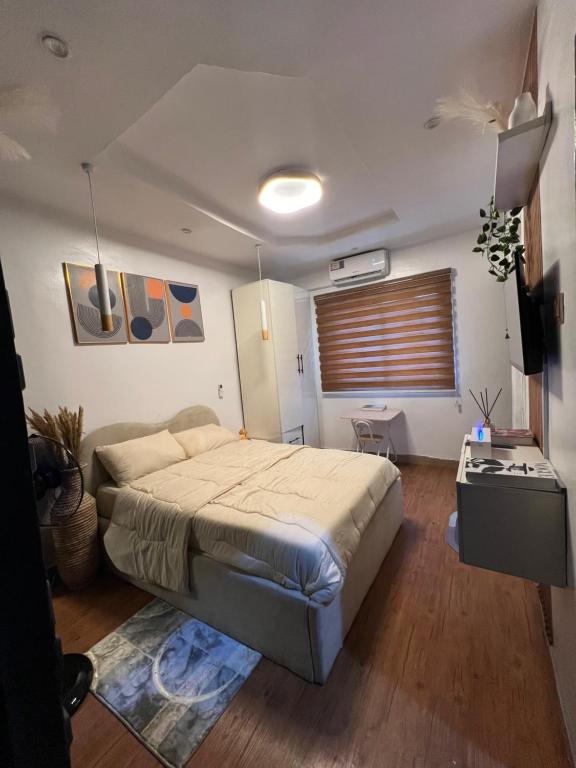 Postel nebo postele na pokoji v ubytování LOGA Apartment
