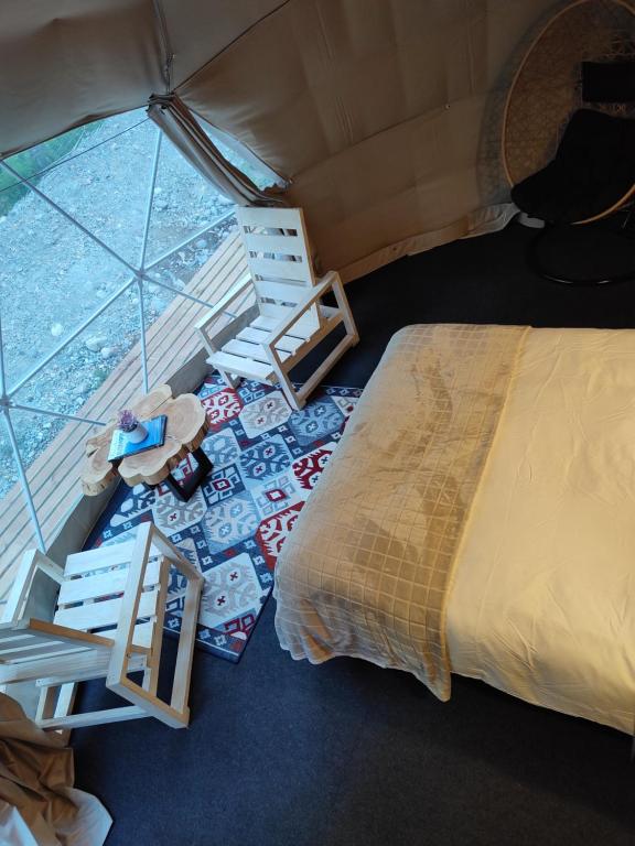 Letto o letti in una camera di Ayün Lodge