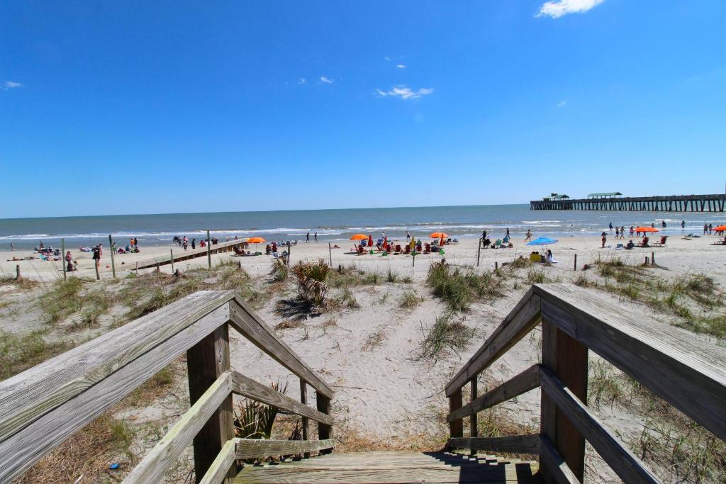 a view of a beach with people on it at 2 Delightful in Folly Beach