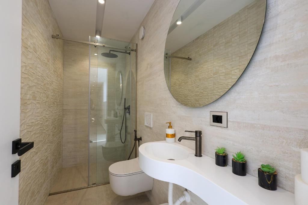Koupelna v ubytování SanPietro Premium Villas