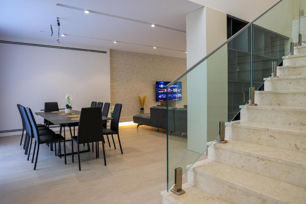 TV a/nebo společenská místnost v ubytování SanPietro Premium Villas