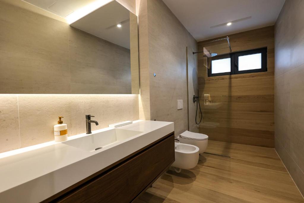 Koupelna v ubytování SanPietro Premium Villas