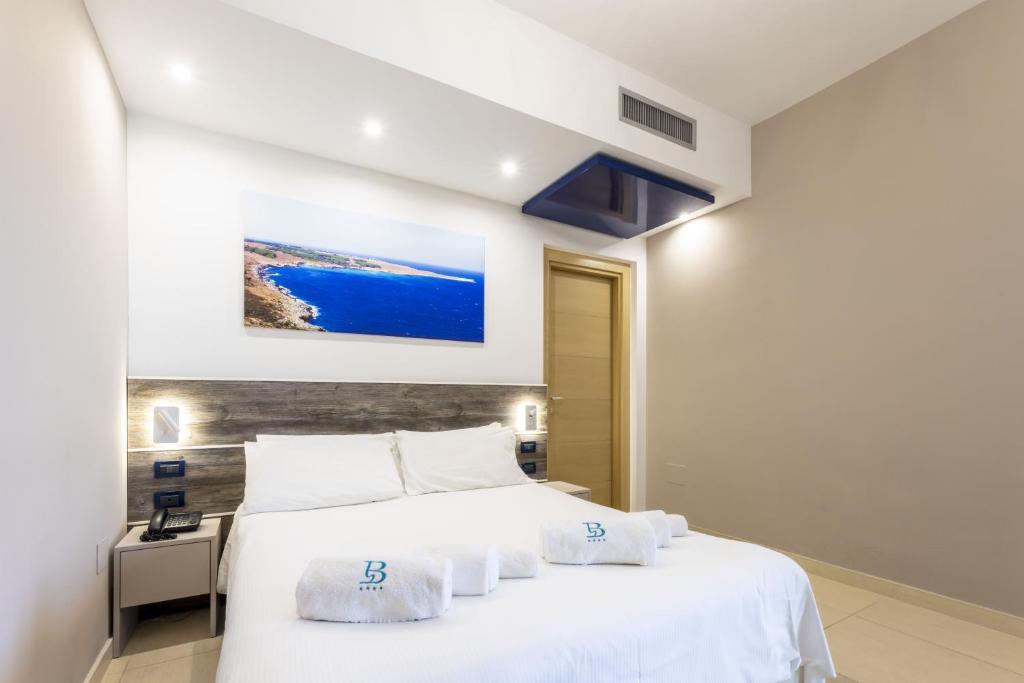 Кровать или кровати в номере Hotel Belvedere