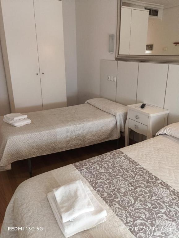 Posteľ alebo postele v izbe v ubytovaní Hotel Principe