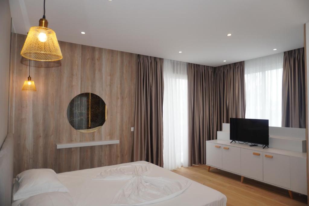 TV a/nebo společenská místnost v ubytování Hotel Colis