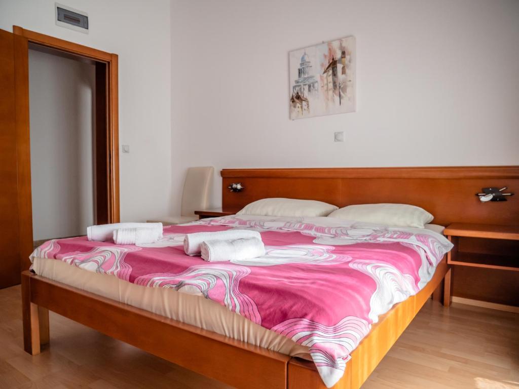 Postel nebo postele na pokoji v ubytování Apartments Bonita