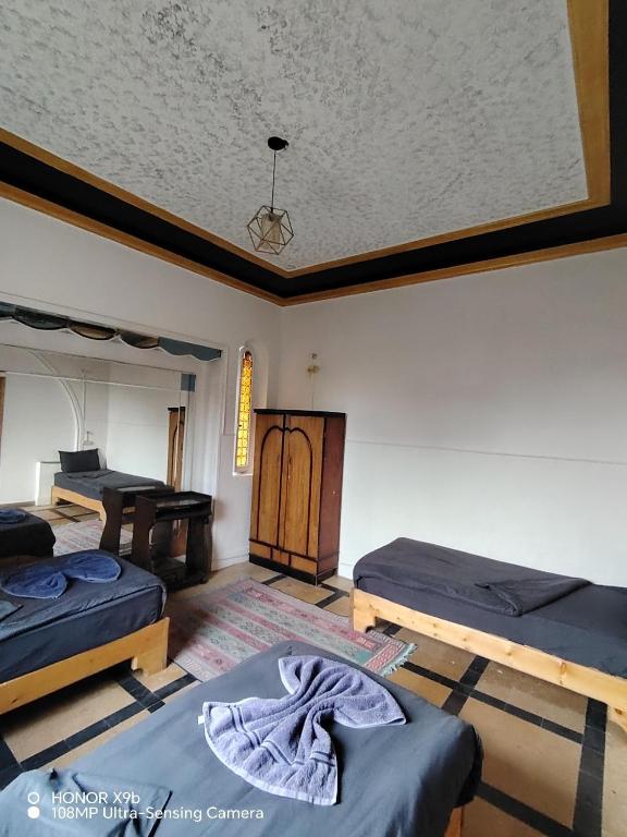 Letto o letti in una camera di Castle Hotel