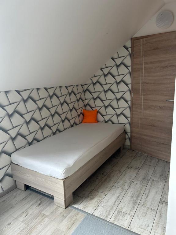 Postel nebo postele na pokoji v ubytování Platán Panzió
