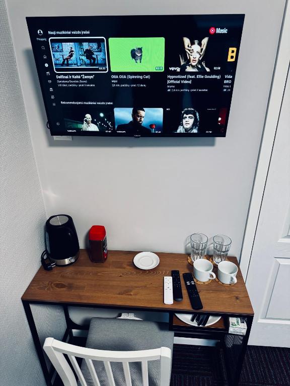 TV a/nebo společenská místnost v ubytování AJ Chocolate Vilnius