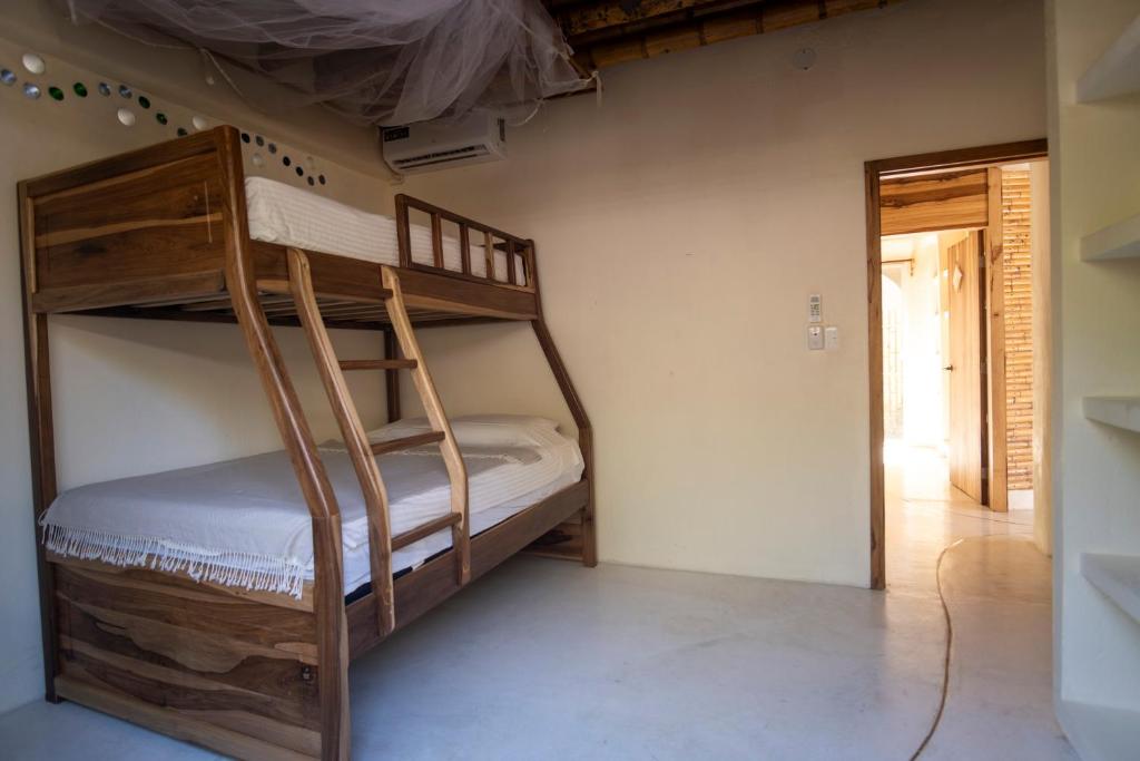 Postel nebo postele na pokoji v ubytování Tierra Munay