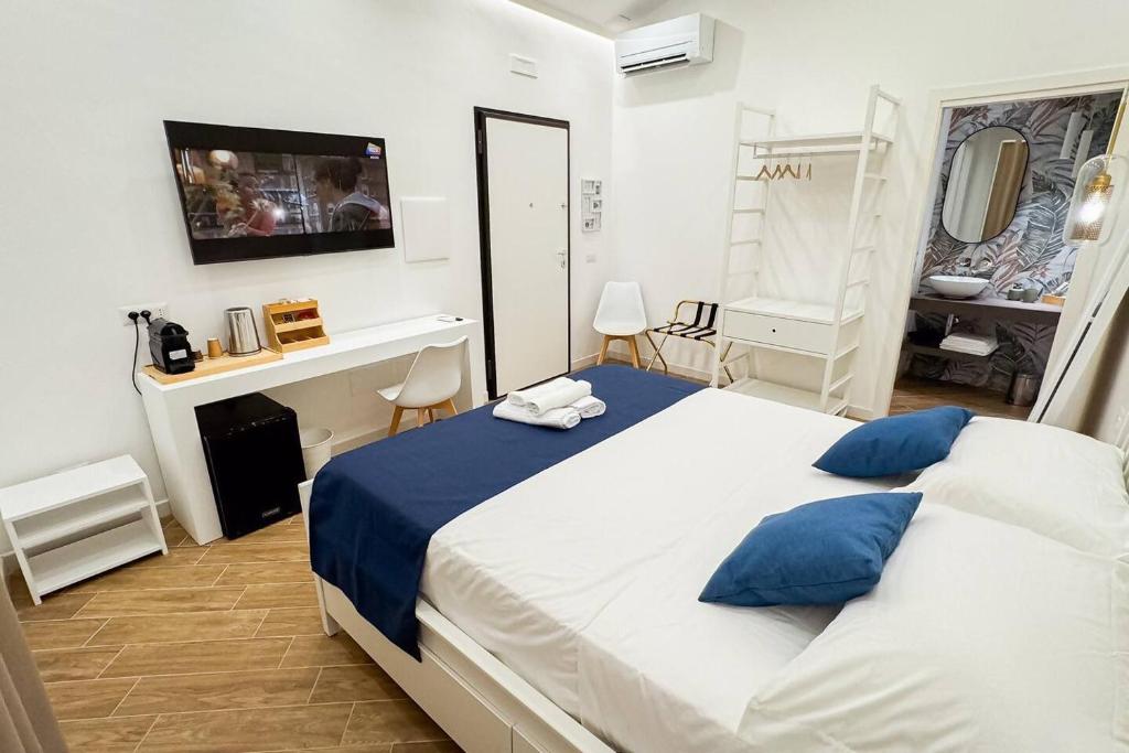 Postel nebo postele na pokoji v ubytování Giandra Rooms and Garden