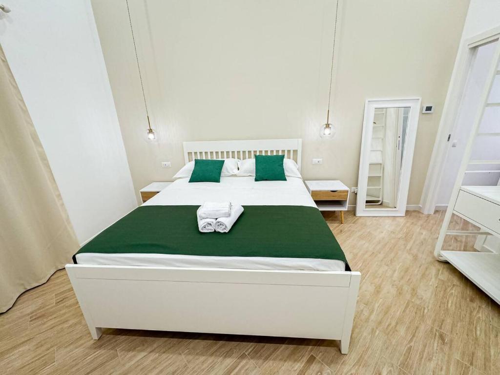 Postel nebo postele na pokoji v ubytování Giandra Rooms and Garden