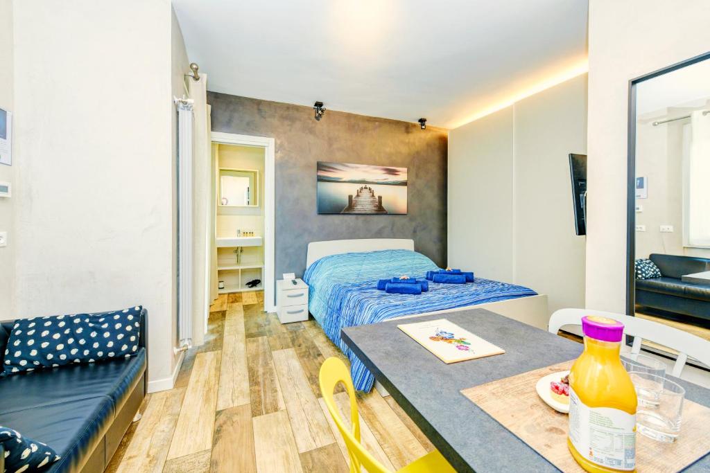 Posteľ alebo postele v izbe v ubytovaní The Geko Apartment Sirmione
