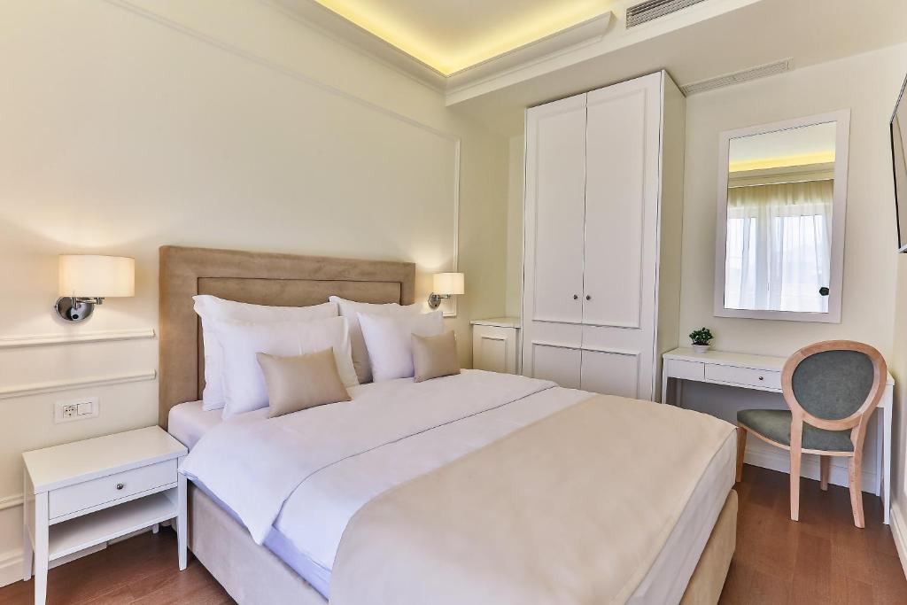 Postel nebo postele na pokoji v ubytování Hotel EDEN